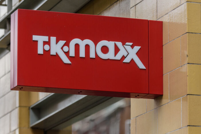 A sign outside a TK Maxx retail store on a central London high street.