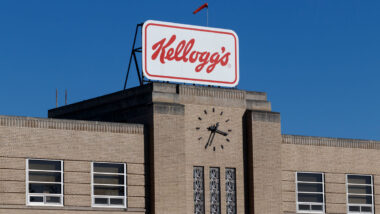 Exterior of a Kellogg's building against a blue sky.