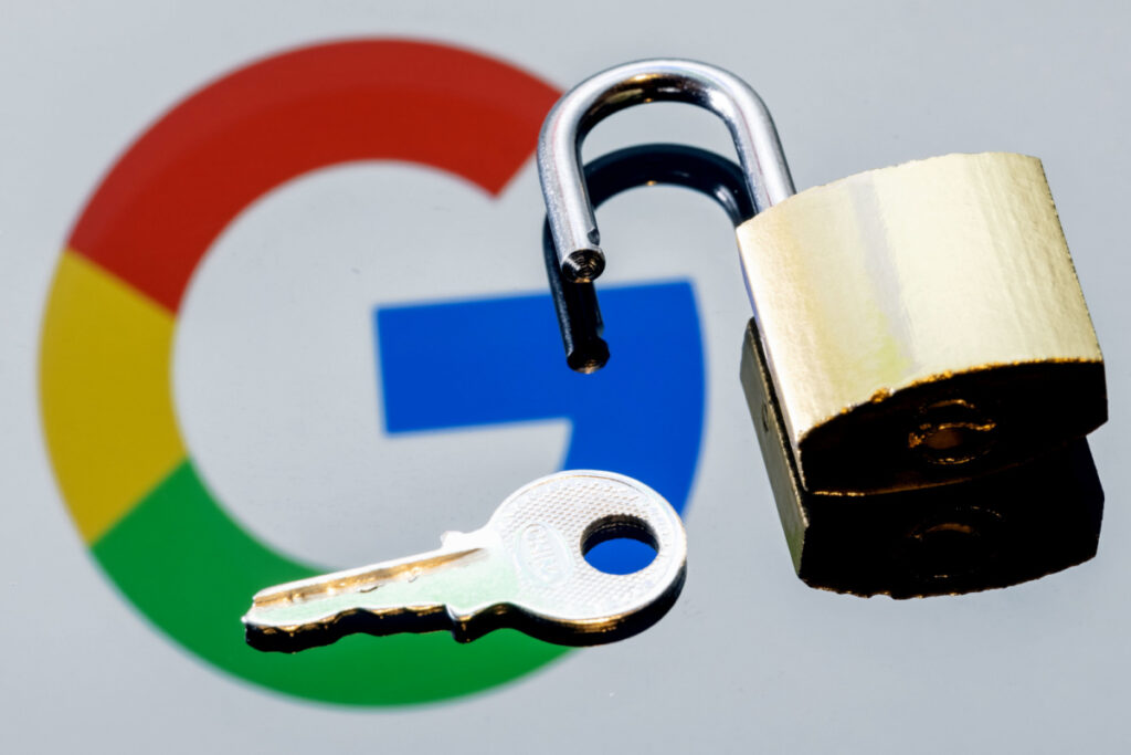 Google Logo with a unlocked lock on top of it