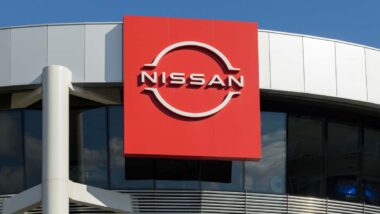 Close up of Nissan signage, representing Nissan electric vehicles.