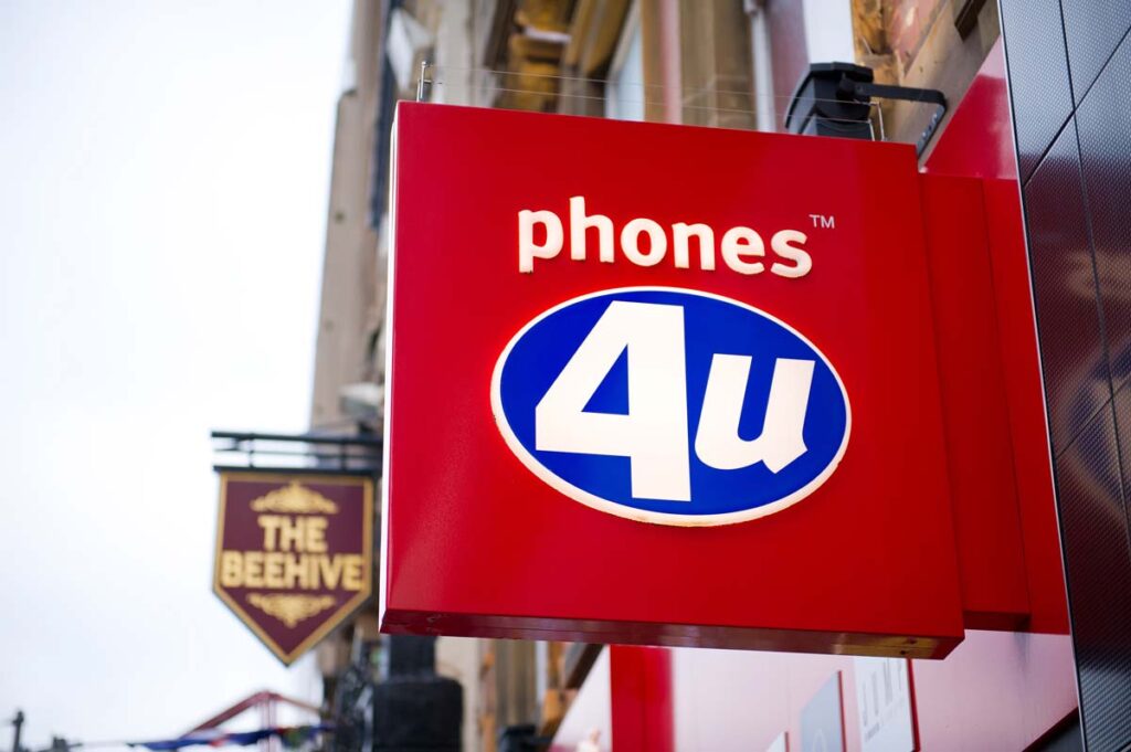 Close up of Phones4u signage, representing mobile phone collusion.