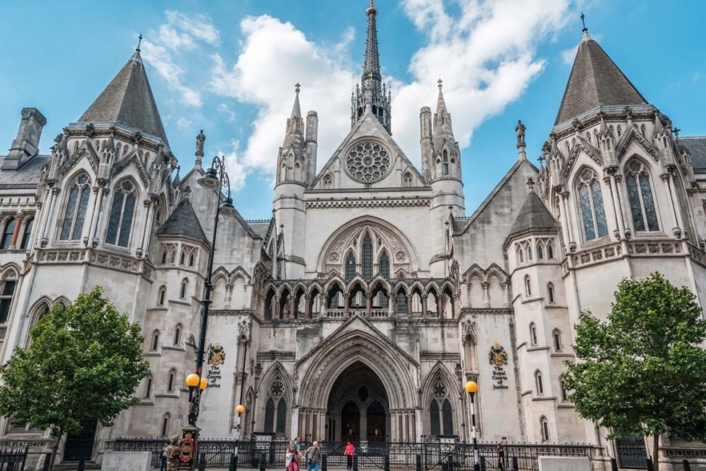 Exterior of the Royal Courts of Justice, representing judges' ability to order dispute resolution.