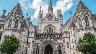 Exterior of the Royal Courts of Justice, representing judges' ability to order dispute resolution.