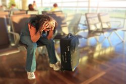 traveller looking frustrated regarding flights being cancelled and airlines not refunding tickets to consumers