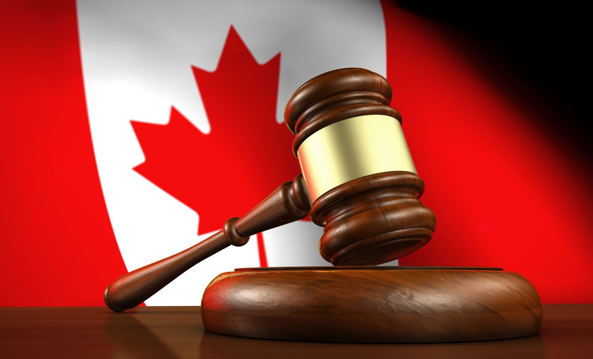 Gavel in front of a Canadian flag regarding information on what a Canadian class action lawsuit - veteran care, Sainte-Anne Hospital
