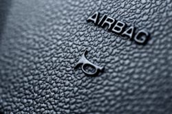 up close shot of an airbag label regarding several airbag recalls by transport Canada