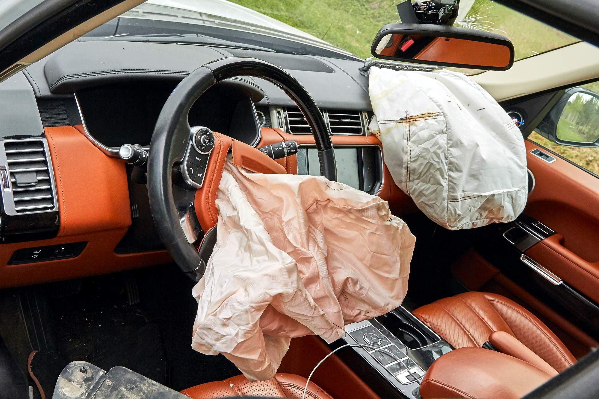 deflated airbags inside car regarding several airbag recalls