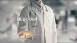 Doctor holding out hand with metformin hovering above it regarding the metformin cancer risk class action lawsuit filed