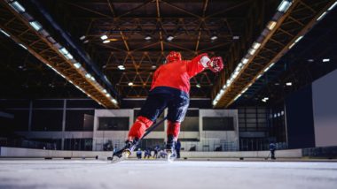 Hockey player skating regarding the Canadian Hockey League minimum wage class action lawsuit settlements