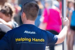 Man wearing Allstate Insurance shirt regarding the Allstate Insurance Company class action lawsuit filed