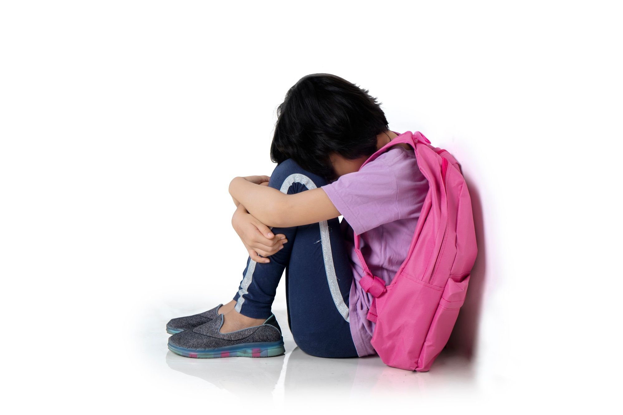 sad little girl regarding the foster children class action lawsuit filed after social worker stole money