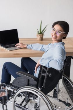 woman with disability at work covered by long-term disability insurance