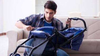 man repairing defective recalled stroller