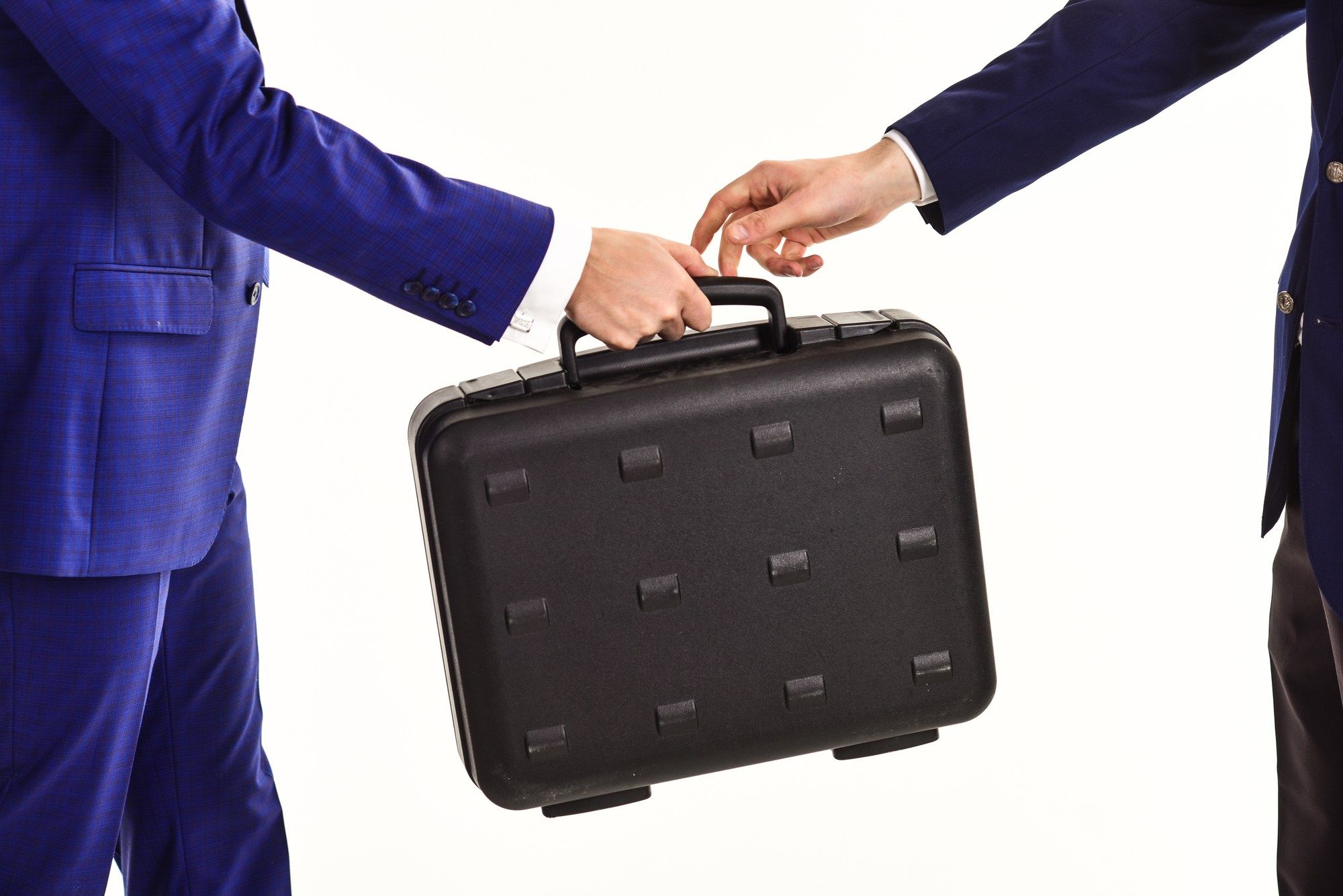 People passing briefcase regarding the immigration lawyer fraud class action lawsuit