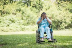 Sad elderly woman regarding the Ontario long-term care homes class action lawsuit