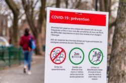 COVID-19 prevention sign in Montreal park
