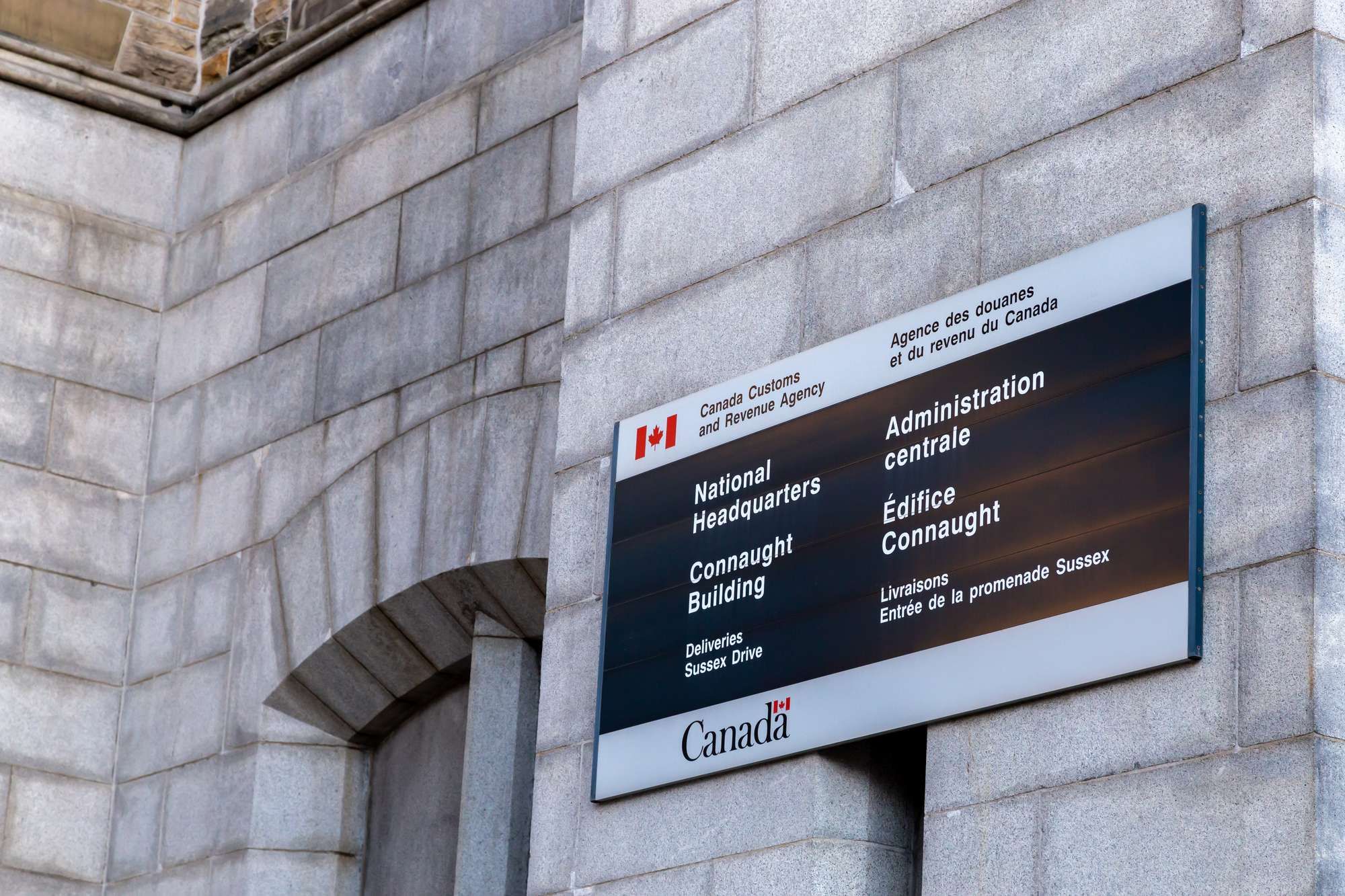 A CRA sign regarding the CRA class action lawsuit filed after several data breaches