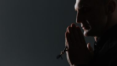 Silhouette of priest regarding the Halifax sex abuse class action lawsuit