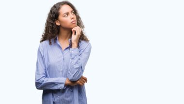 woman thinking about what Canadian class action lawsuit damages are