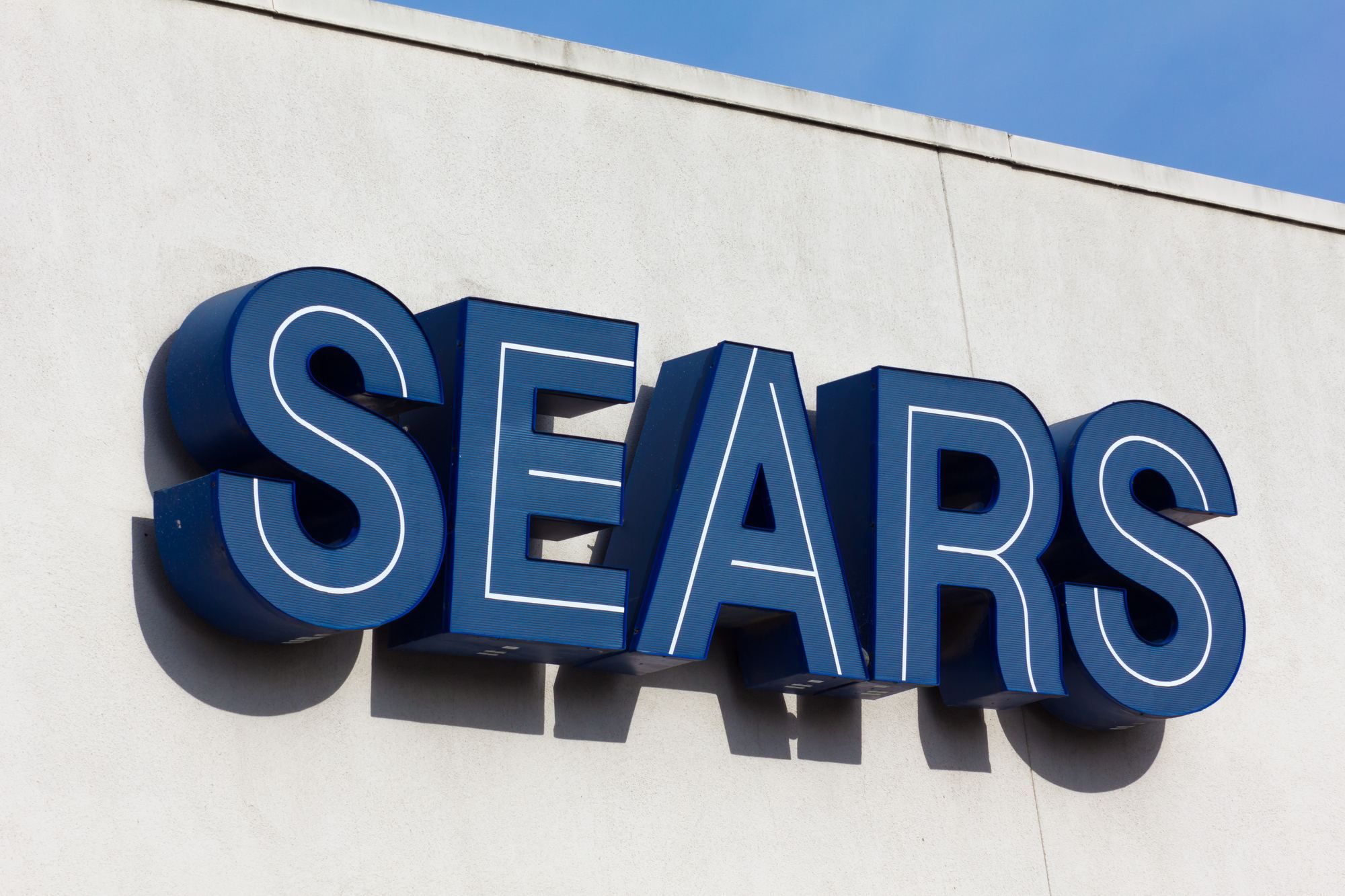 Sears sign regarding the Sears Canada settlement
