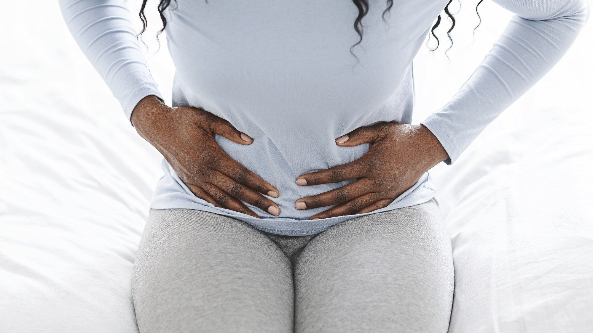 Woman having abdominal pain - BSC Transvaginal Mesh Settlement - Boston Scientific