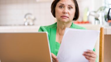 Person holding denial letter regaridng information onwhat to do if your BMO insurance claim is denied