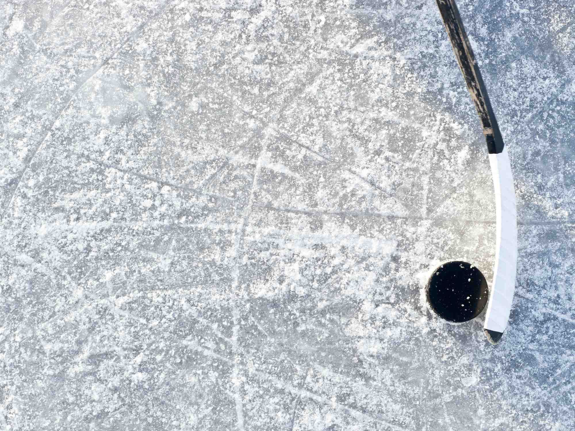 Hockey puck on ice regarding the junior hockey league class action settlement being on thin ice