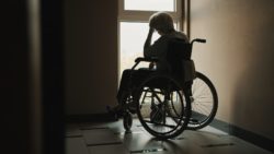 Depressed senior in wheelchair regarding Canada's largest COVID-19 Lawsuit naming Extendicare 
