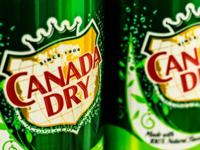 Close-up shot of two Canada Dry cans