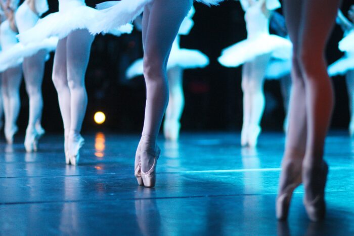 Flawless classical ballet, dancers standing on their tip-toes