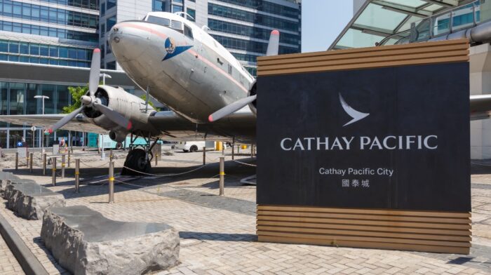 Cathay Pacific City headquarters with Douglas DC-3 airplane