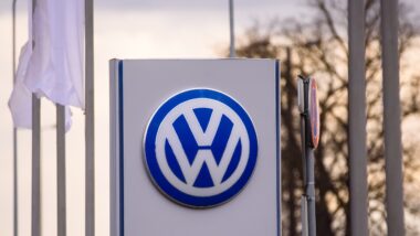 Volkswagen company logo near automobile centre.