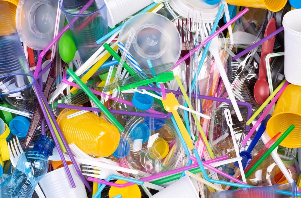 Close up of single-use plastic items.