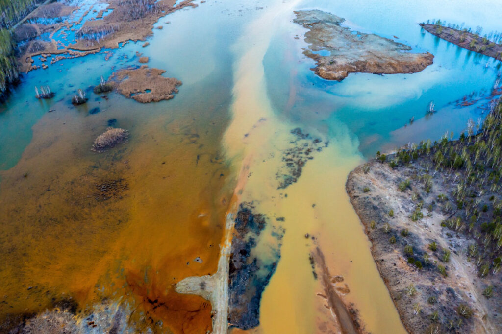 Aerial view of a polluted river.