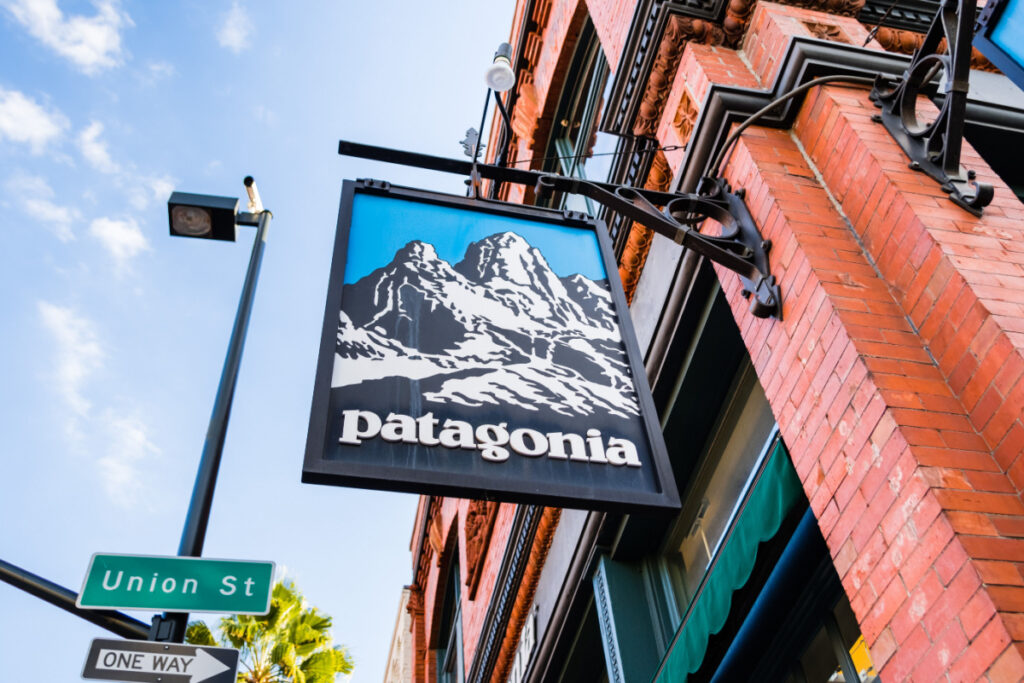 Patagonia store sign hanging from brick building