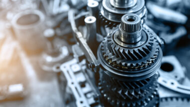 Close up of an auto transmission, representing the Canadian Auto Parts settlement.