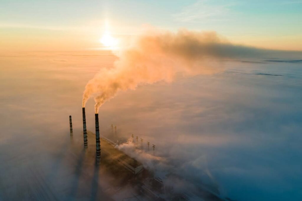 Smoke migrating from a power plant, representing the Canada methane regulations.